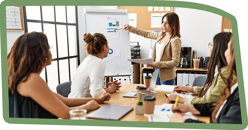 Group of young businesswomen listening boss conference during meeting at the office.