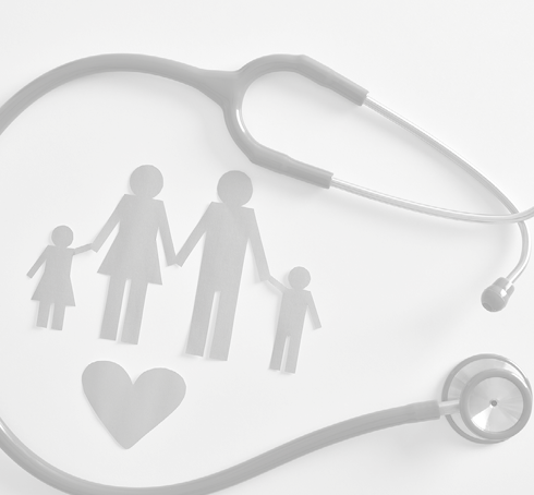 Concept of family medicine with ostetoscope and paper cut of family and heart on a white table. Top view. Horizontal composition.