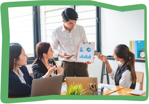 Young entrepreneurs asian male leader in business casual presenting financial report to team while working on setting up new business