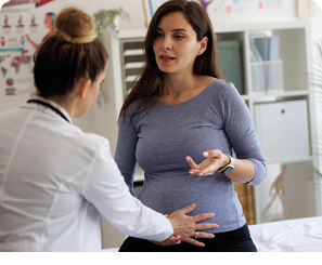 Shot of a worried pregnant woman having a consultation with a doctor