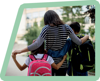 Mother taking kids to school