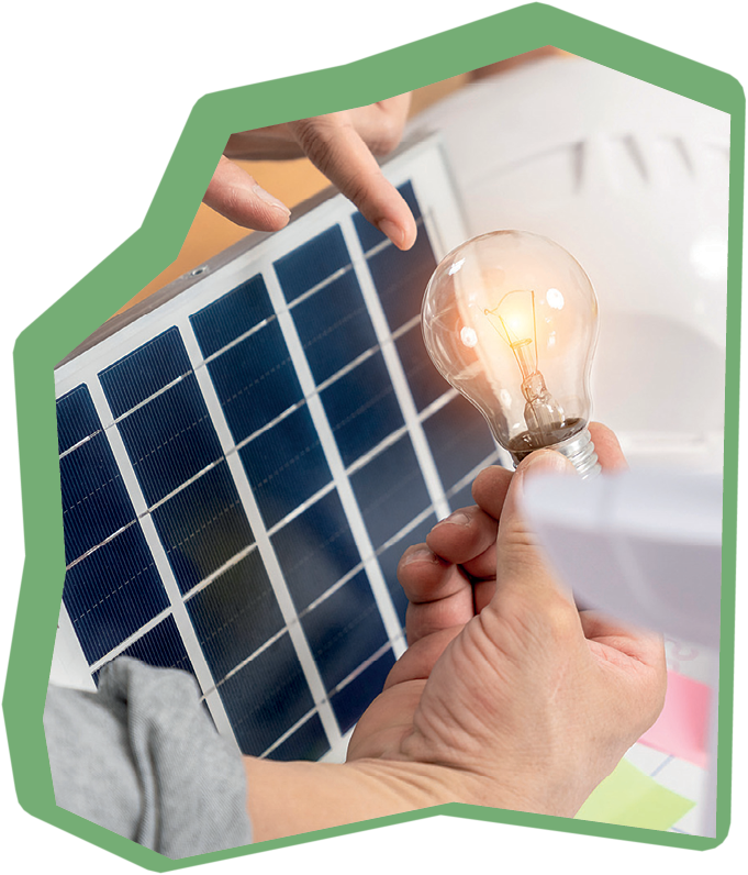 Young Asian woman with solar panel and light bulb, Solar energy concept.