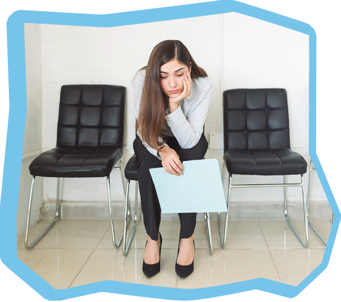 Bored Hispanic female applicant sitting with resume in waiting room during recruitment at office
