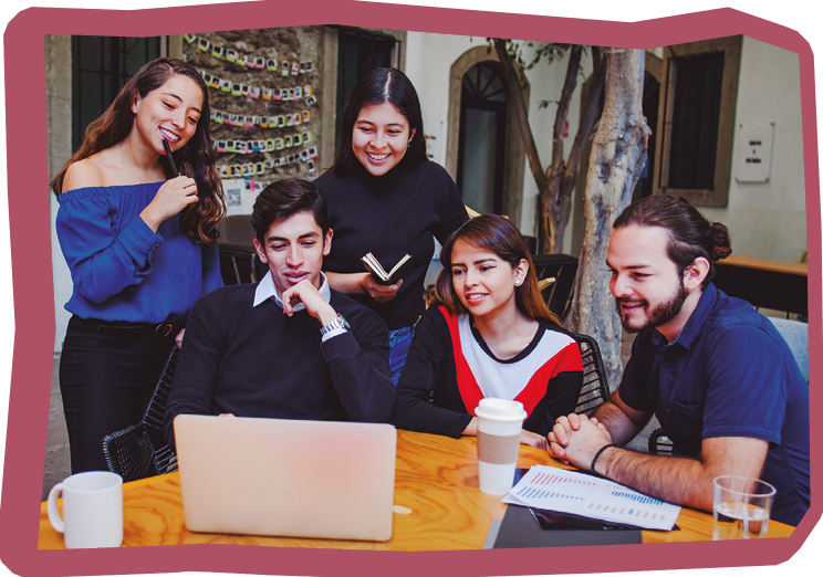 Young latin university students studying with computer in college in Latin America