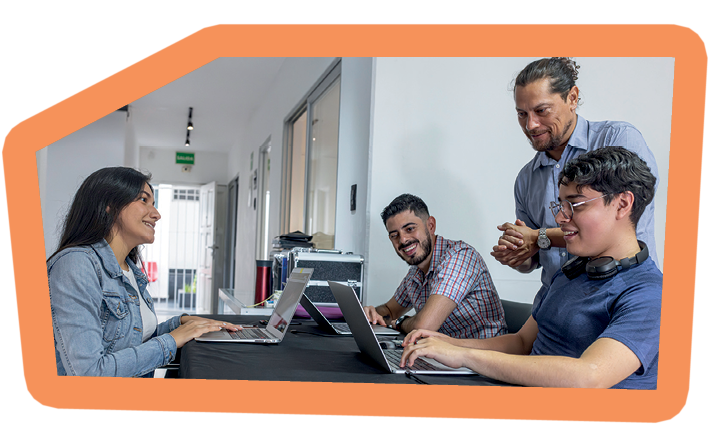 Teacher gives computer classes to his students