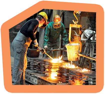 Group of workers in a foundry at the melting furnace - production of steel castings in an industrial company